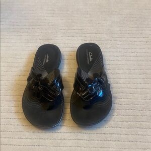 Clarks Glossy Black Slide Sandals
